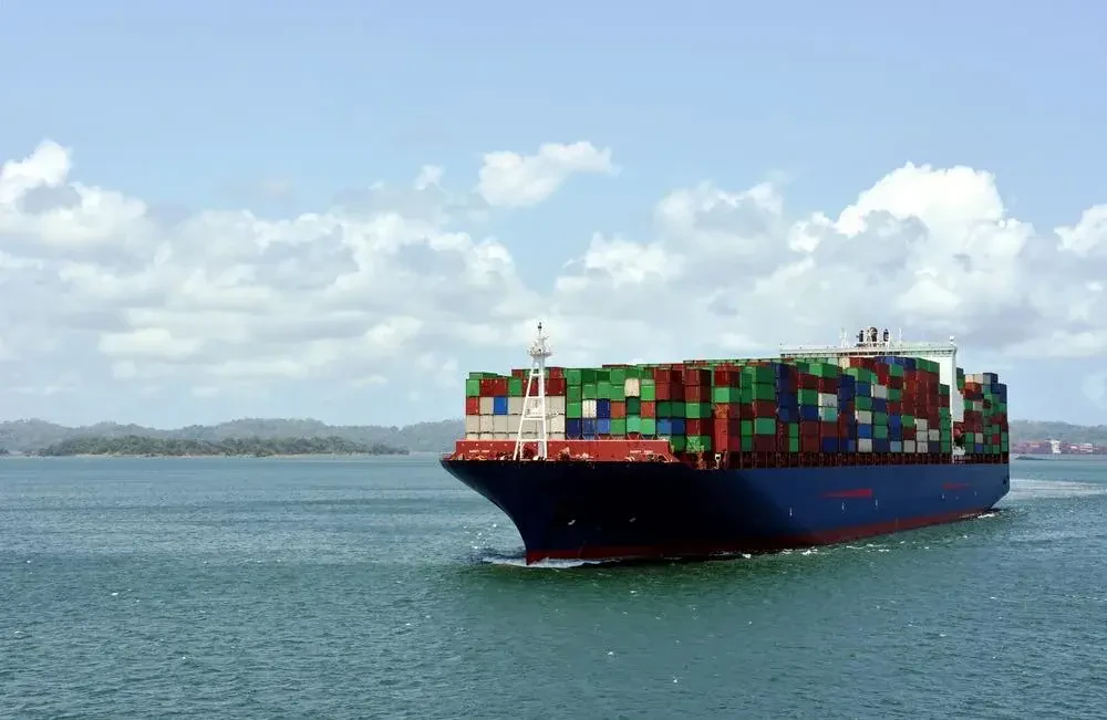 Ocean freight vessel with containers and shipping boxes