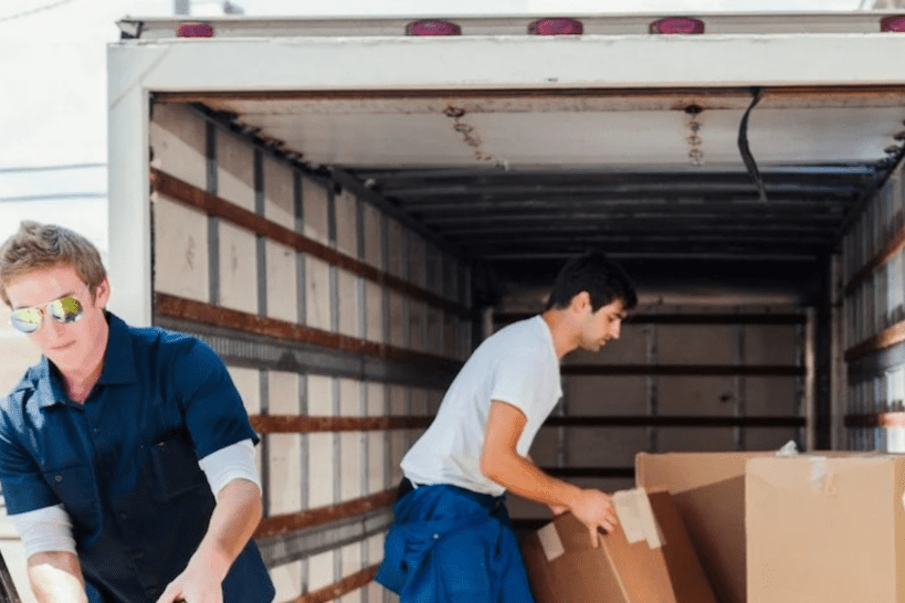 movers-loading-boxes-inside-moving-truck-organizing-cargo.png
